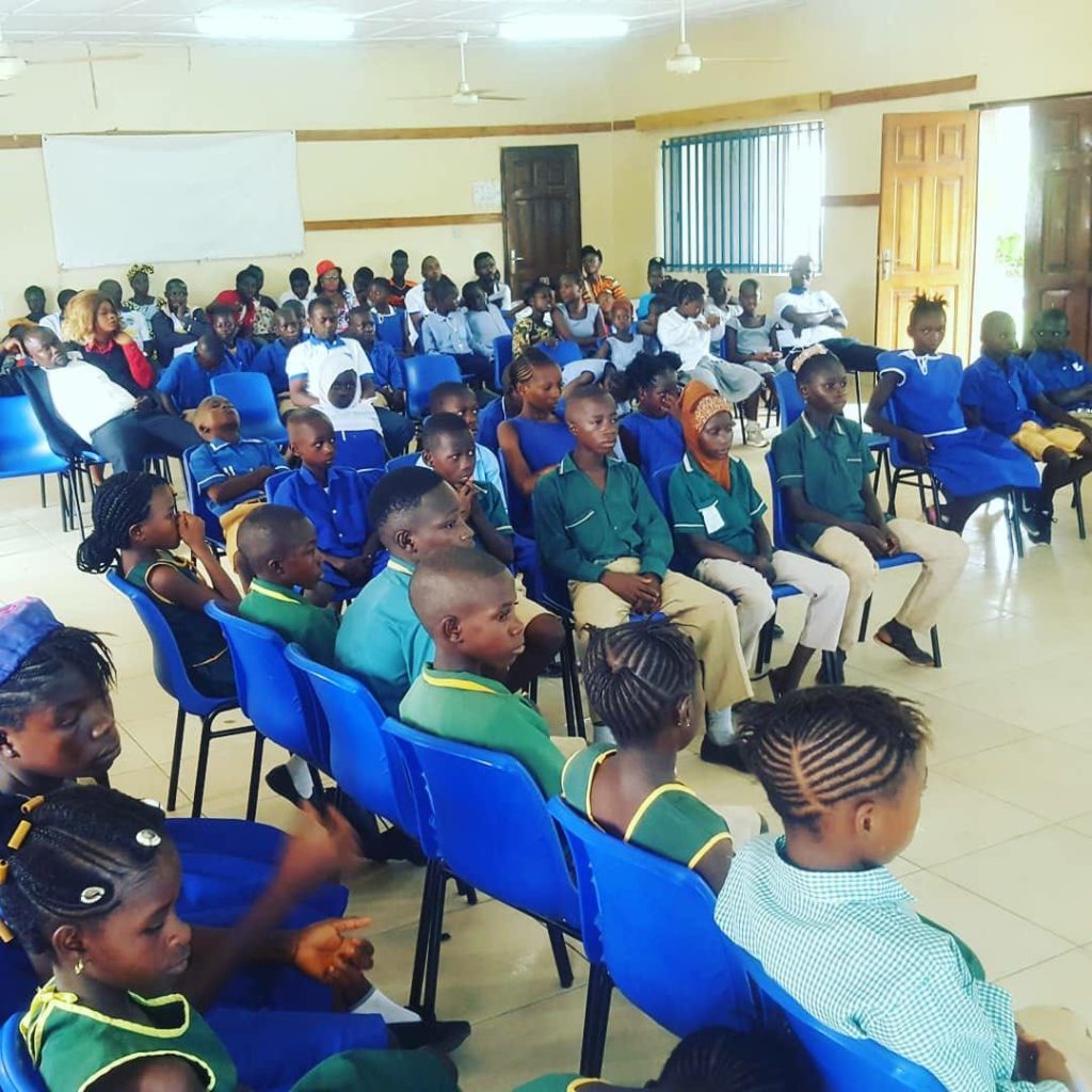 Pupils seated in a hall during the CARDO Debate and Quiz Competition